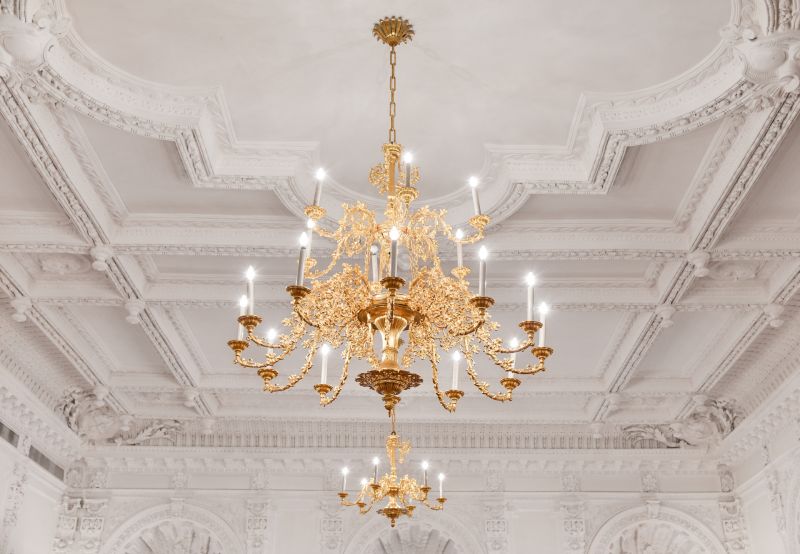 Chandeliers add an elegant and decorative touch to large rooms.
